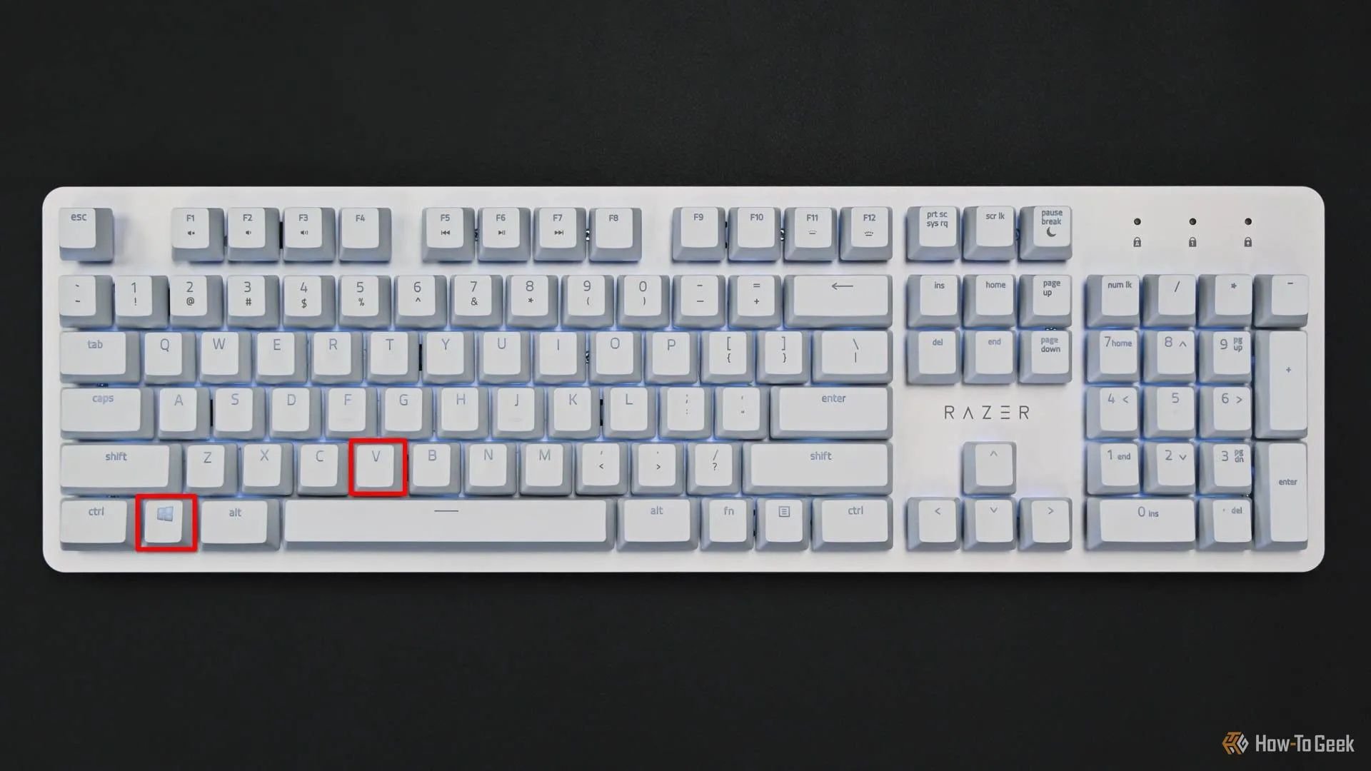 Bàn phím hiển thị phím Meta và V, tổ hợp phím mở lịch sử clipboard trên KDE Plasma.