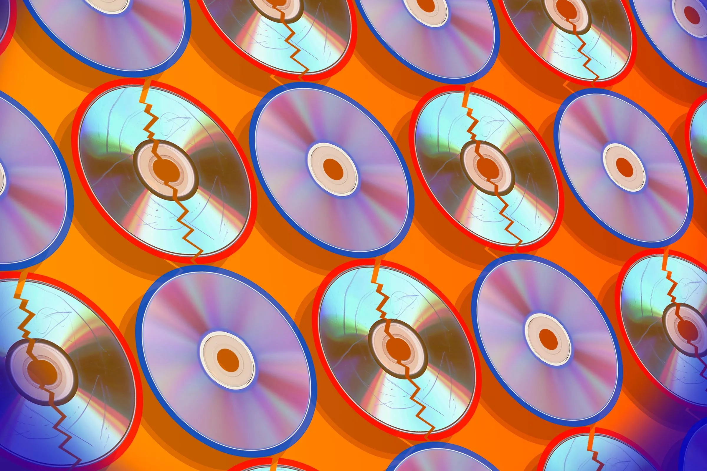 Bộ sưu tập đĩa DVD và Blu-ray xếp cạnh nhau, một số đĩa hiển thị dấu hiệu hư hỏng do disc rot