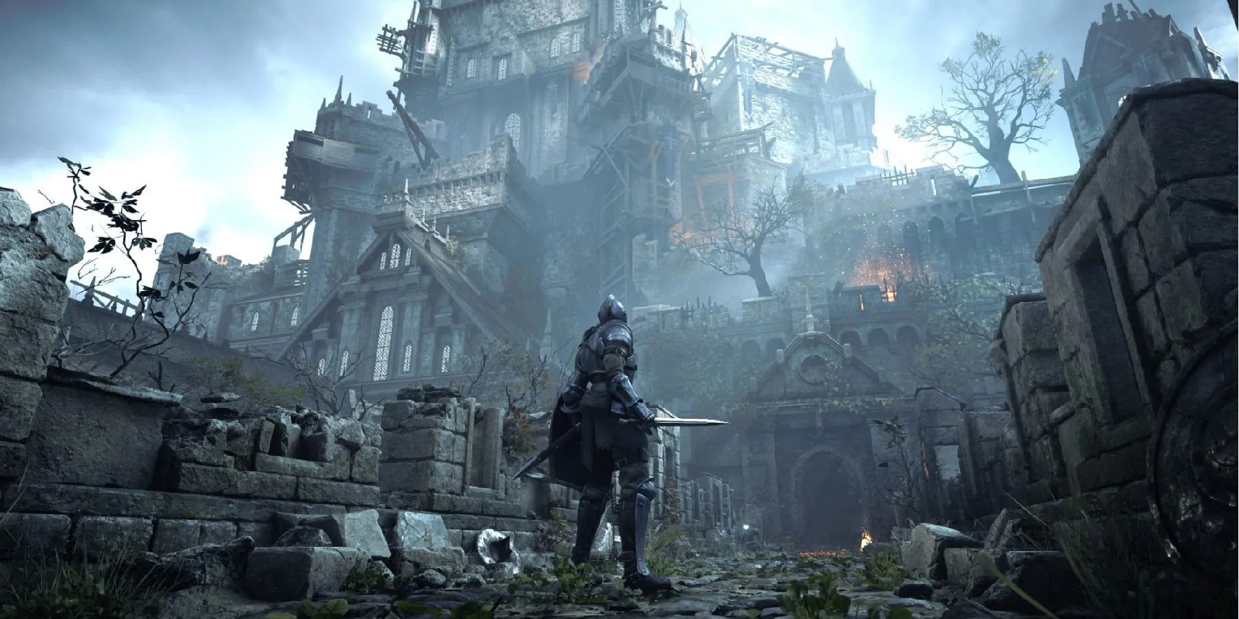 Cảnh quan thành Boletaria lộng lẫy trong Demon's Souls (2020) - một ví dụ điển hình của remaster với đồ họa được làm lại hoàn toàn.