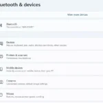 Cửa sổ "Thêm thiết bị" trên Windows 11 với tùy chọn Bluetooth được chọn để ghép nối thiết bị mới