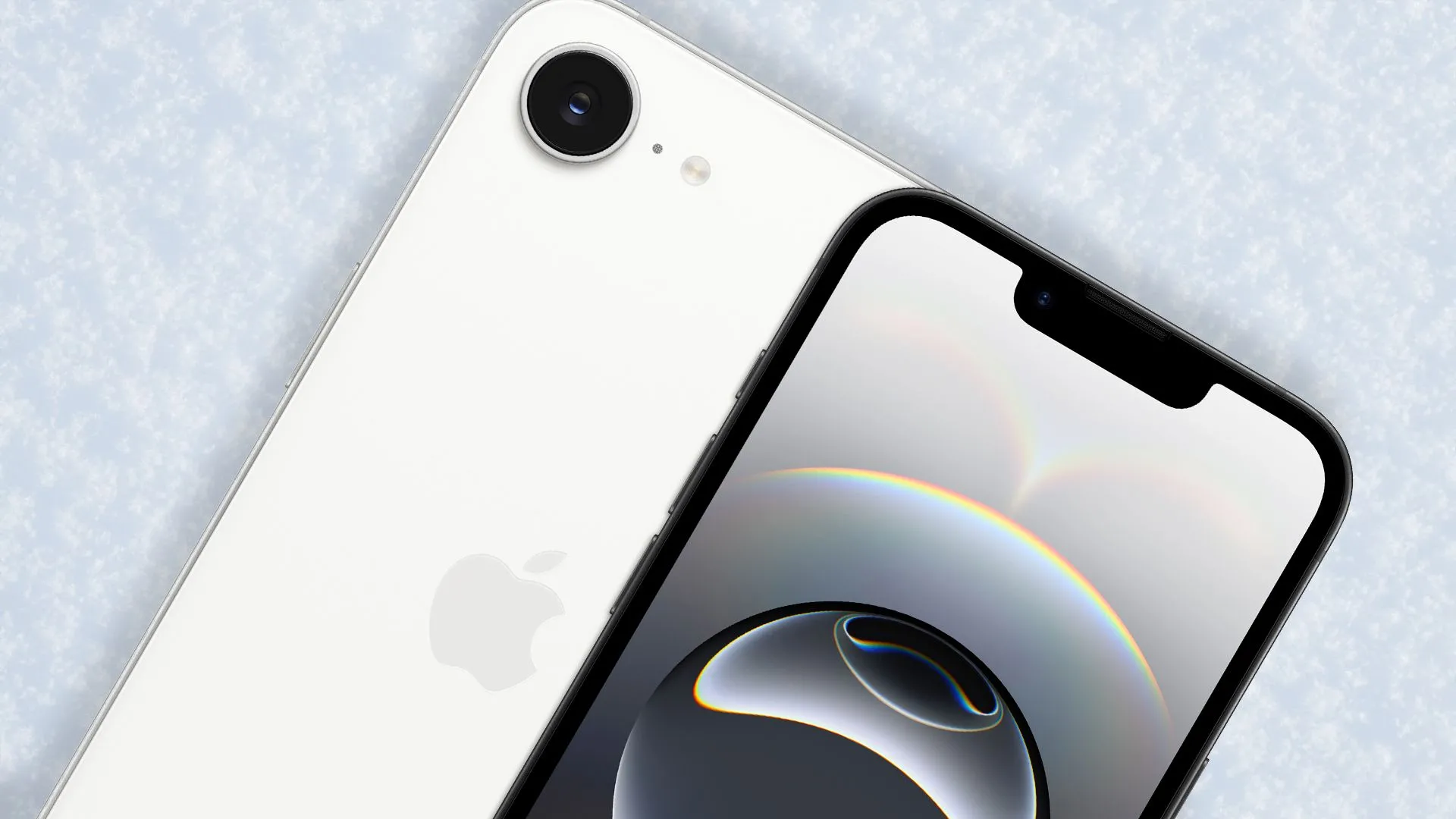 Điện thoại iPhone 16e màu đen với màn hình tai thỏ lớn, đặt trên nền tuyết trắng.