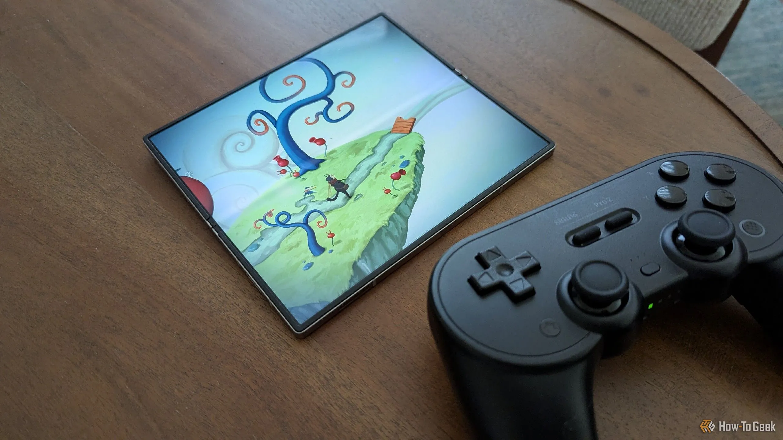 Game Figment trên Galaxy Z Fold 6 cùng bộ điều khiển 8BitDo Pro 2, cho thấy trải nghiệm chơi game PC port tối ưu trên di động.