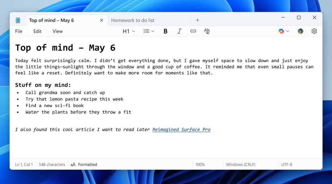 Giao diện Notepad trên Windows 11 hiển thị văn bản được định dạng bằng Markdown và thanh công cụ định dạng mới