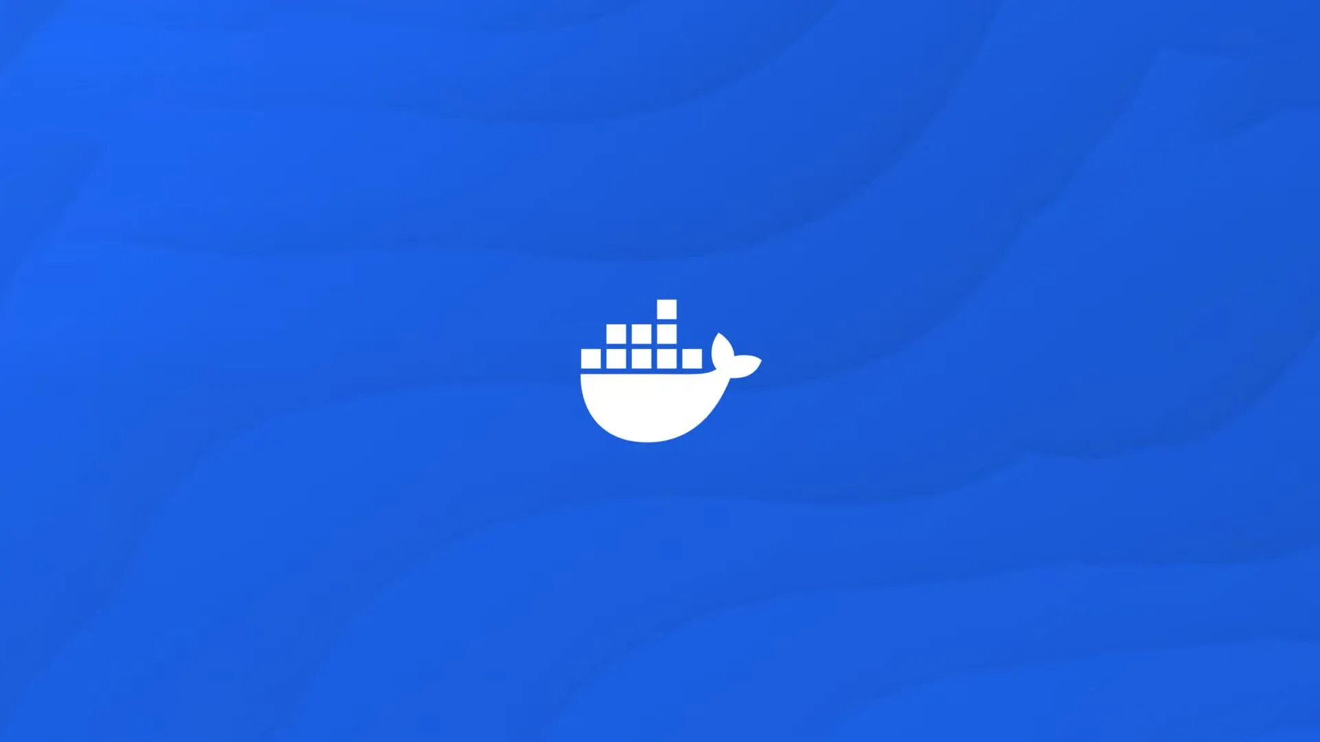 Logo Docker màu trắng trên nền xanh biểu tượng cho công nghệ ảo hóa container