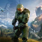 Master Chief cầm vũ khí trong khung cảnh rừng cỏ của Halo Infinite, biểu tượng một thời của game độc quyền Xbox