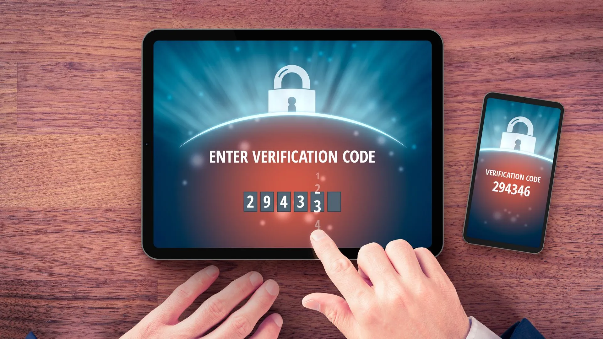 Người đang nhập mã xác thực hai yếu tố (2FA) vào máy tính bảng, nâng cao bảo mật tài khoản trực tuyến.