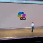 Rajesh Jha giới thiệu biểu tượng Copilot mới của Microsoft 365 tại Ignite 2024, nhấn mạnh chi phí tăng cho AI.