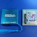 Wii Kawaii mod siêu nhỏ gọn đặt cạnh hộp băng Game Boy, minh chứng cho kích thước ấn tượng